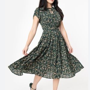 Unique Vintage 1950s Green Floral Swing Dress